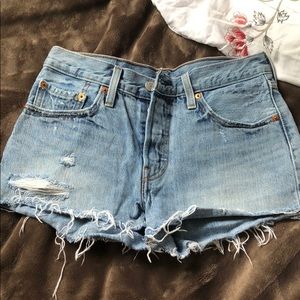 Distressed Levi’s denim shorts
